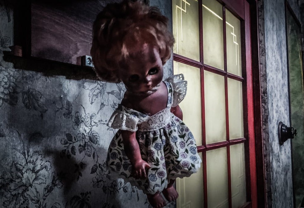 An antique doll with