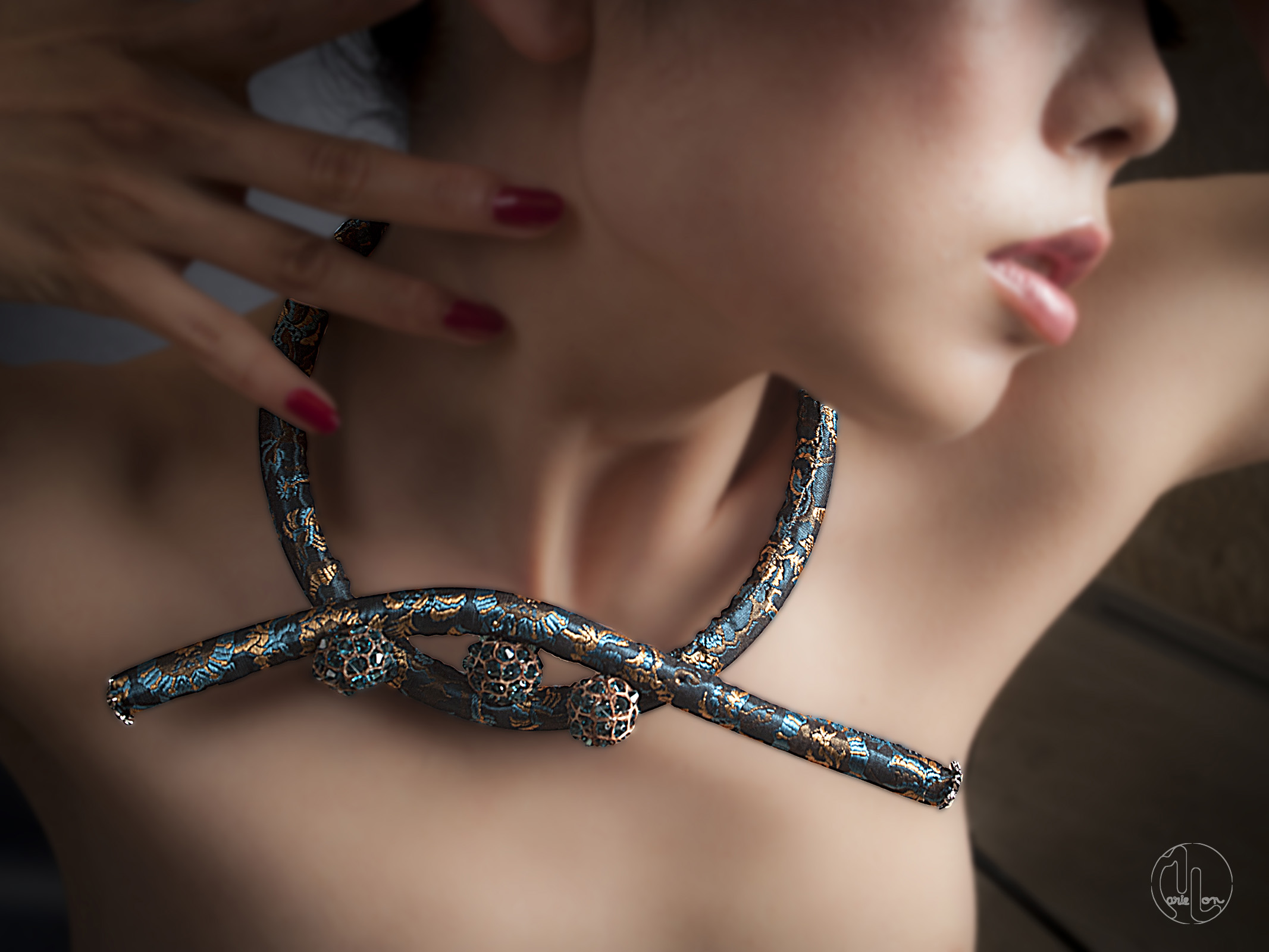 Blue and black textile necklace worn around a woman