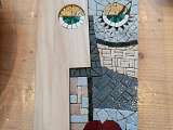 visage en mosaïque et bois