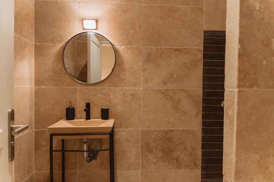 Bathroom with single sink and mirror