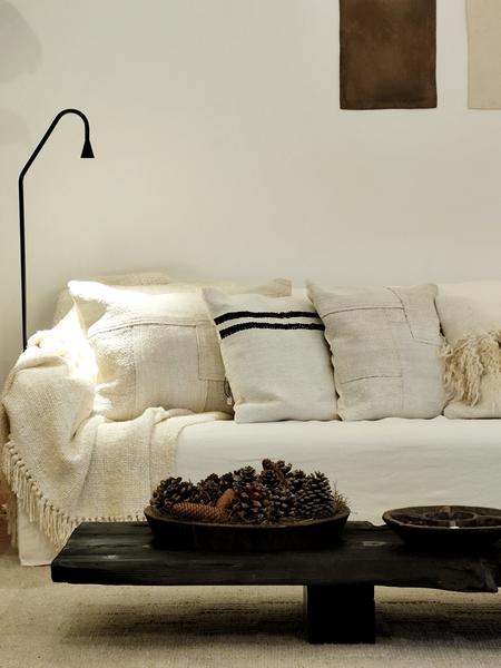 White sofa with a black table