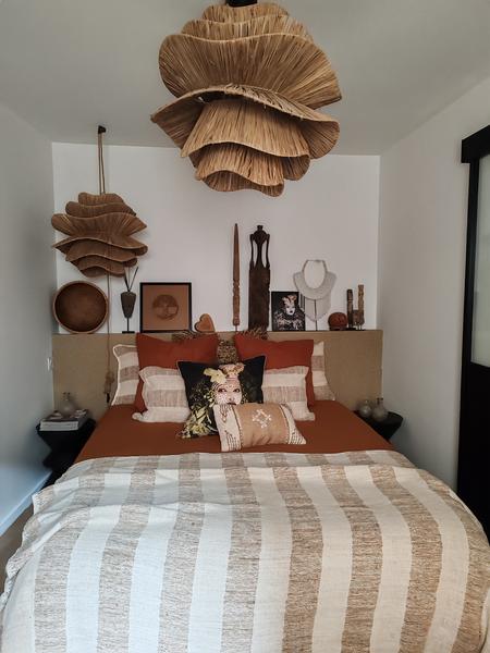 double bed with bohemian chandelier 