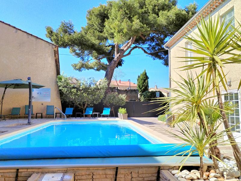 The outdoor swimming pool at the Hotel La Bastide d